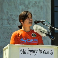 Andrea Miller speaks in front of the Oregon state Capitol