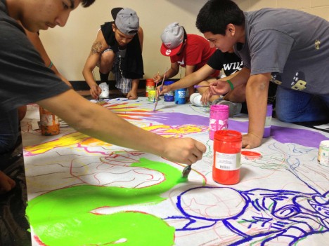 Youth create a mural with our partner Instituto In Xocitl In Cuicatl Art and Culture.