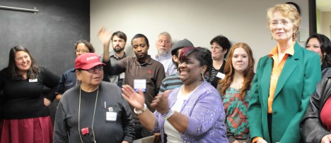 A group of people celebrate with Sharon Gary-Smith at 2015 Open House